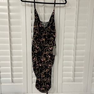 Trendy black slinky dress. Cute butterfly and chain design. XL adjustable length